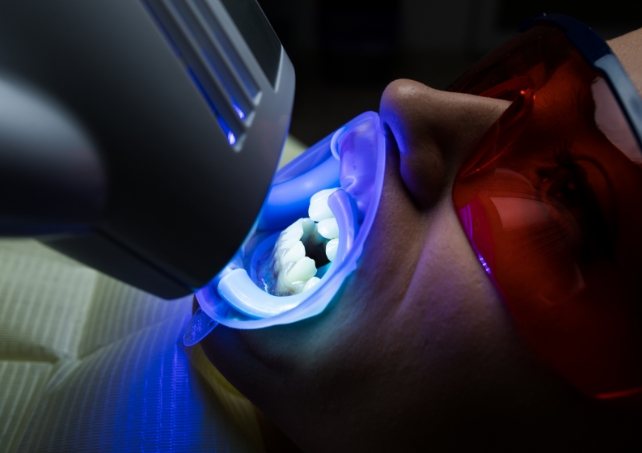 Patient receiving zoom teeth whitening