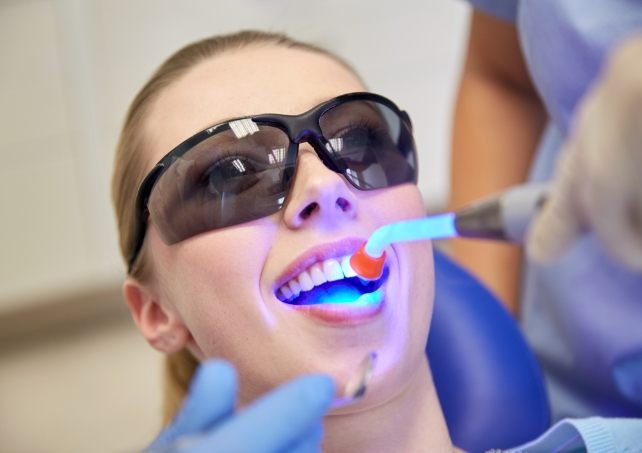 Patient receiving dental bonding