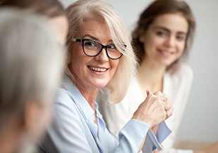 A complete smile from dentures can help advance your career