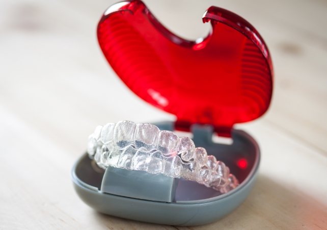 Invisalign clear braces in carrying case