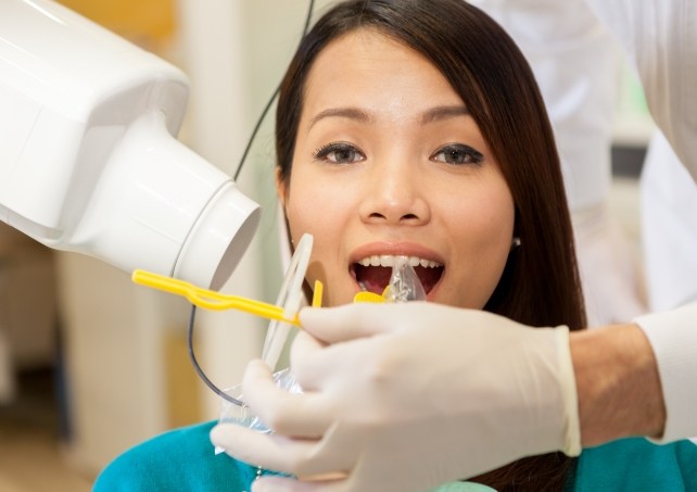 Patient receiving dental checkup