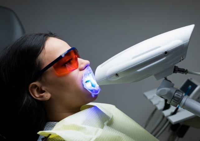 Patient receiving professional teeth whitening
