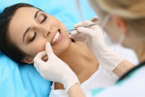 a female patient with her dentist