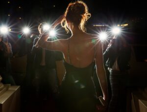 Woman being photographed. 