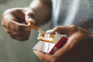 Man grabbing a cigarette